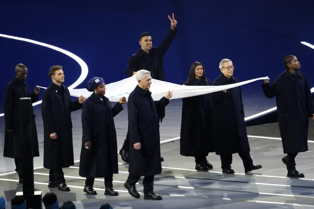 Tongan Olympian Pita Taufatofua Tears Up in Suit at 2026 Olympics Win