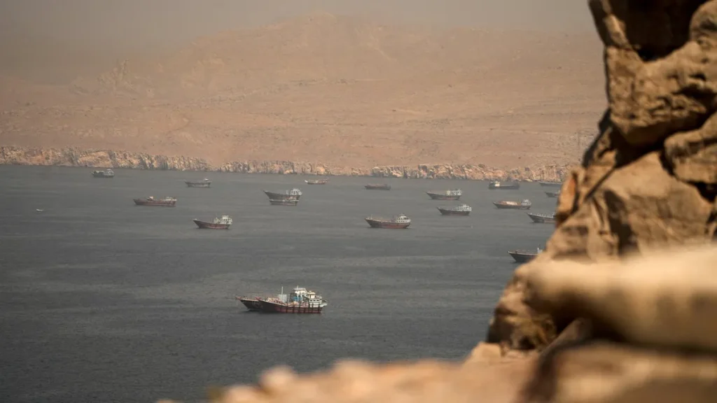 Hormuz Strait Tensions Escalate as Ship Hit Amid US-Iran Military Standoff Hormuz Strait Tensions Escalate as Ship Hit Amid US-Iran Military Standoff